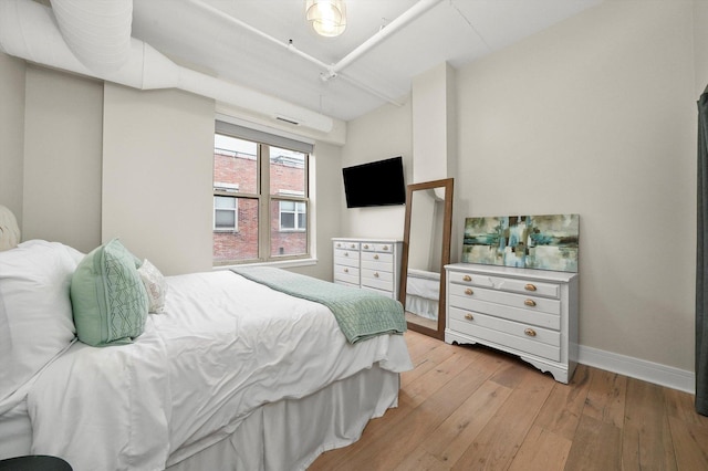 bedroom featuring light hardwood / wood-style floors