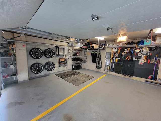 garage featuring a workshop area