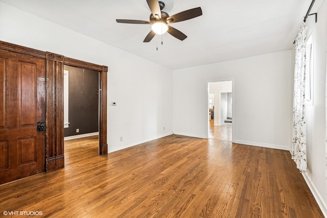 interior space with hardwood / wood-style flooring and ceiling fan