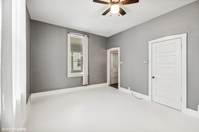 empty room featuring ceiling fan