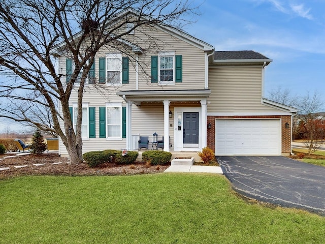 front facade with a garage and a front lawn