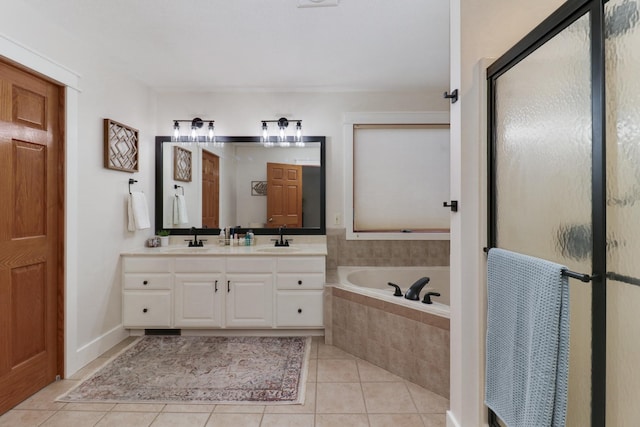 bathroom featuring plus walk in shower, tile patterned floors, and vanity