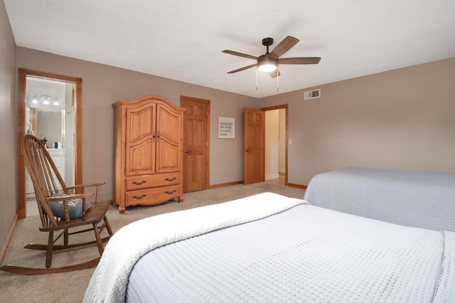 bedroom with ceiling fan and light colored carpet