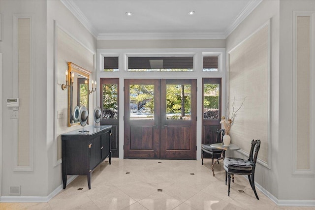 entryway featuring ornamental molding, light tile patterned floors, and french doors