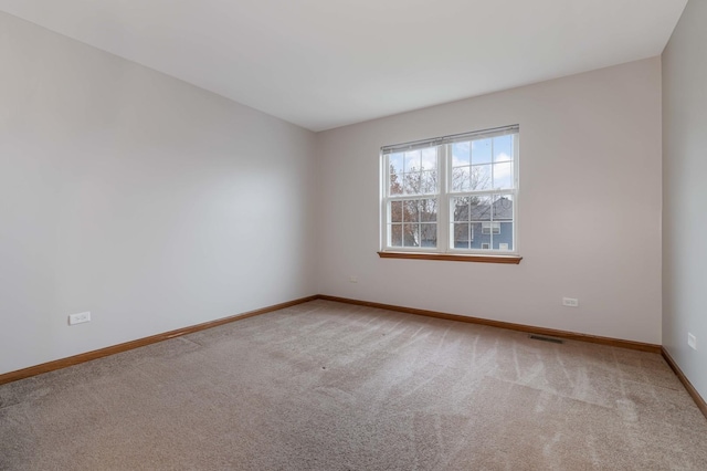 view of carpeted spare room