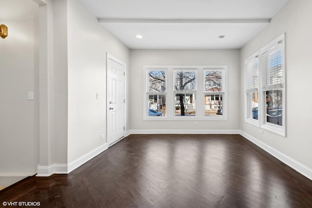 foyer entrance with dark hardwood / wood-style flooring