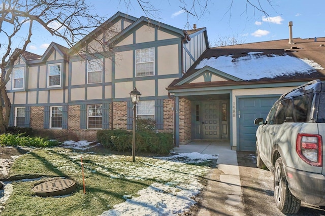 tudor home with a garage