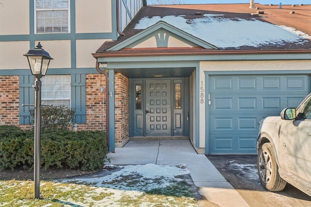 property entrance with a garage