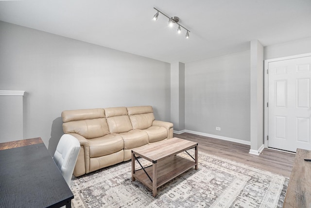 living room with light hardwood / wood-style floors