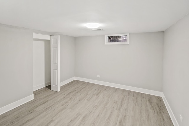 basement featuring light hardwood / wood-style flooring