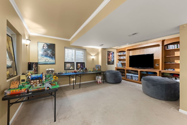 playroom with ornamental molding and carpet flooring