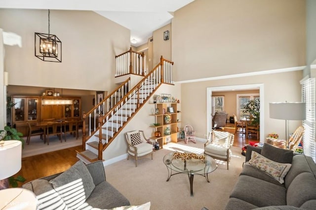 276 Stanton Dr, Buffalo Grove, IL 60089 - living room with a high ceiling, a chandelier, and stairway