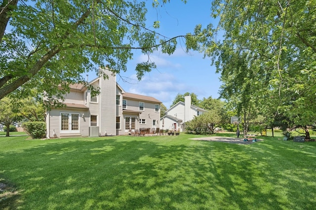 276 Stanton Dr, Buffalo Grove, IL 60089 - view of green lawn featuring french doors