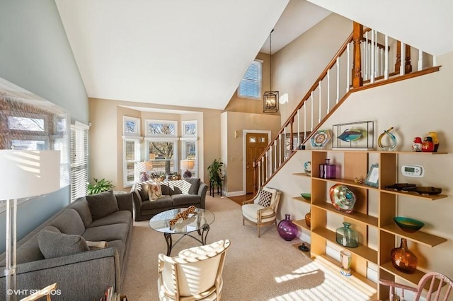 276 Stanton Dr, Buffalo Grove, IL 60089 - living room featuring high vaulted ceiling, carpet, and stairs
