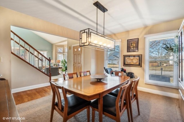 276 Stanton Dr, Buffalo Grove, IL 60089 - dining area with healthy amount of natural light, carpet floors, stairway, and a chandelier