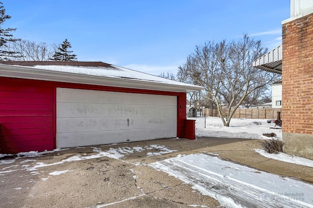 view of snow covered garage