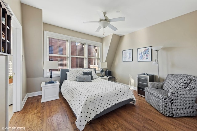 bedroom with ceiling fan and wood-type flooring