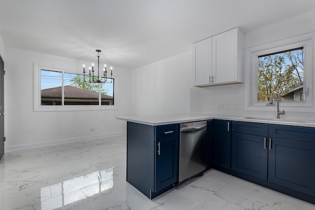 kitchen with white cabinetry, kitchen peninsula, blue cabinets, stainless steel dishwasher, and sink