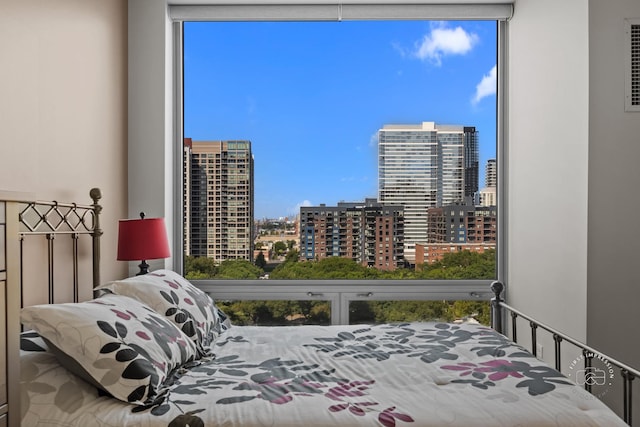 bedroom featuring multiple windows