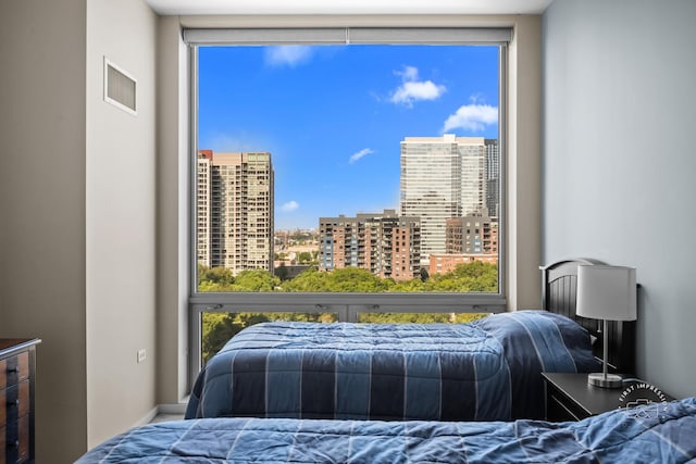 bedroom featuring multiple windows