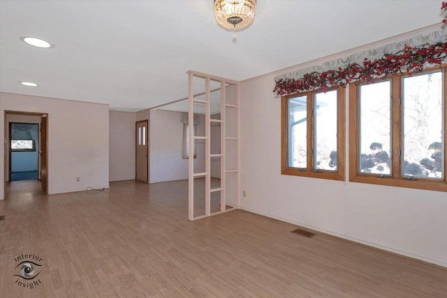 empty room featuring hardwood / wood-style floors