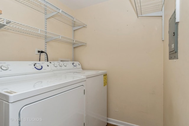 laundry room with separate washer and dryer