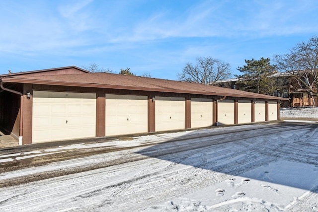 view of snow covered garage