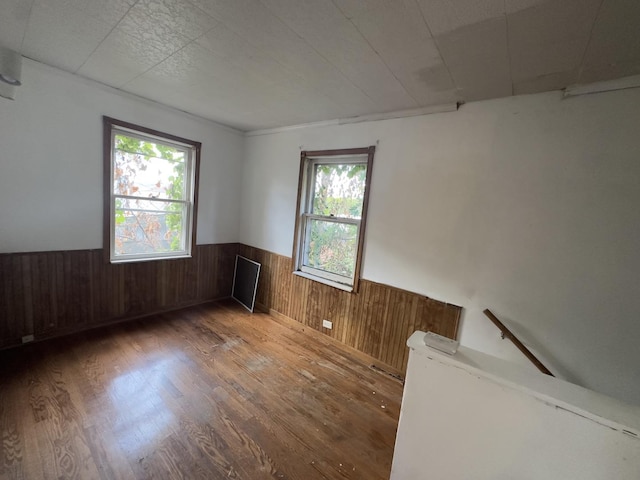 empty room featuring hardwood / wood-style flooring