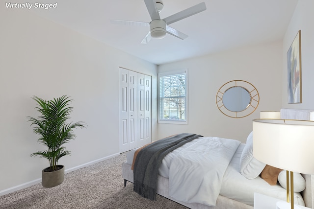 bedroom featuring ceiling fan, a closet, and carpet flooring