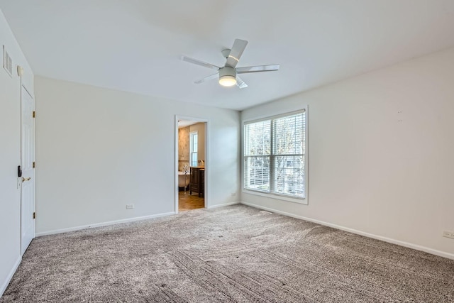 unfurnished bedroom featuring ceiling fan and carpet floors