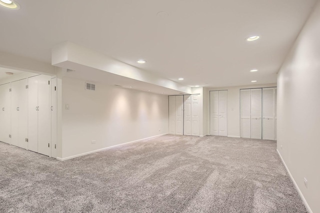 basement with carpet flooring