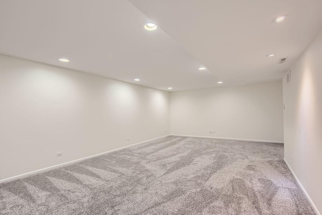 unfurnished room featuring carpet flooring