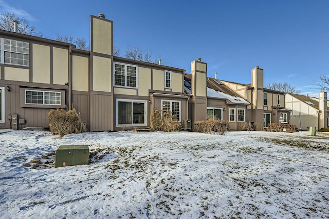 view of snow covered property