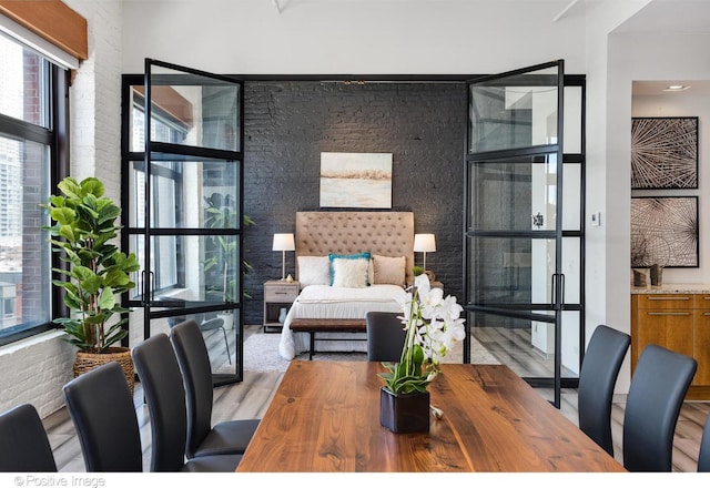 bedroom with light wood-type flooring