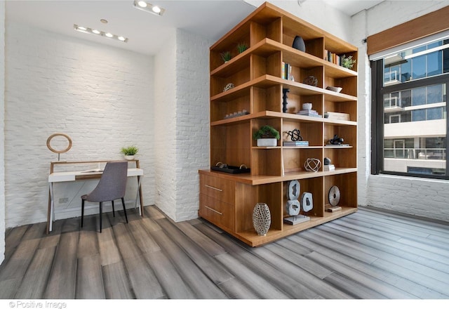 wine cellar with dark wood-type flooring