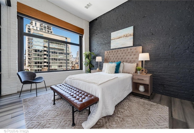 bedroom featuring hardwood / wood-style floors