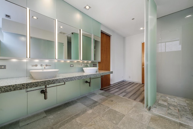 bathroom with backsplash and vanity