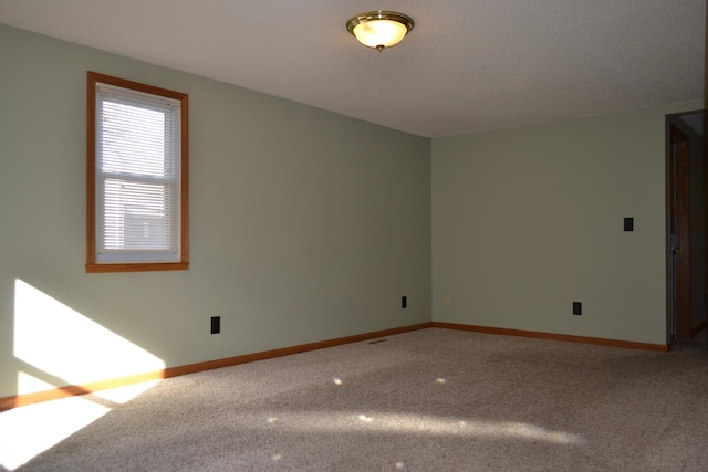 empty room with carpet floors