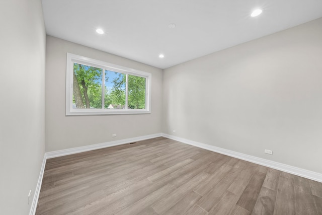 empty room featuring light hardwood / wood-style flooring