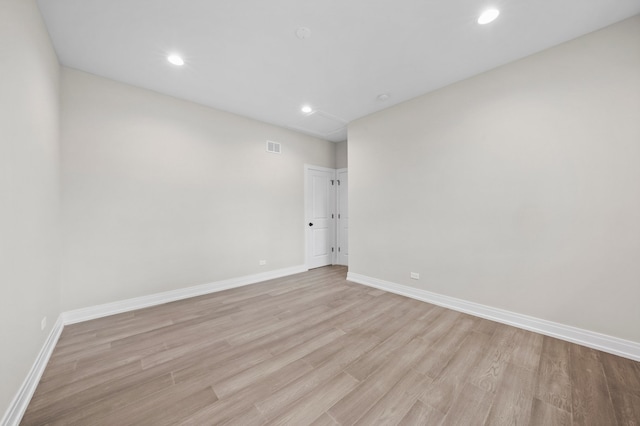 empty room with light wood-type flooring