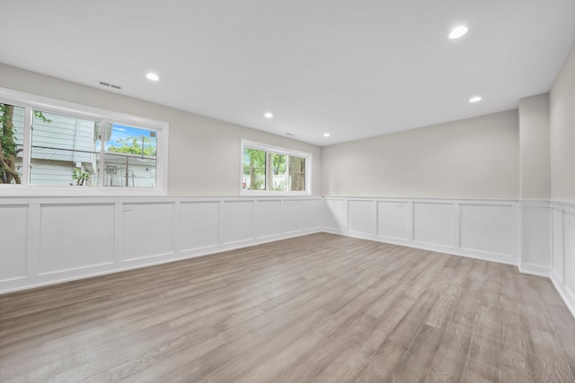 empty room with light wood-type flooring