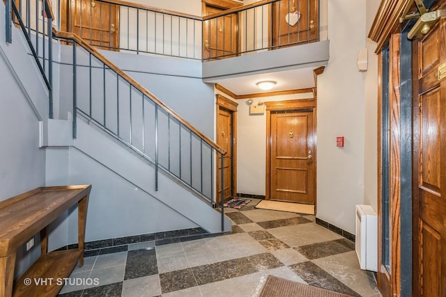 entrance foyer with a towering ceiling