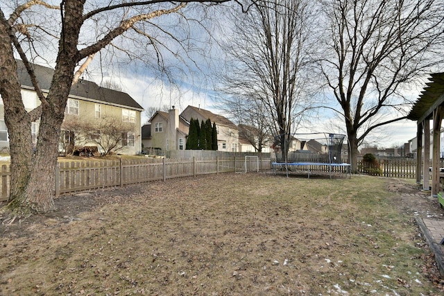 view of yard featuring a trampoline