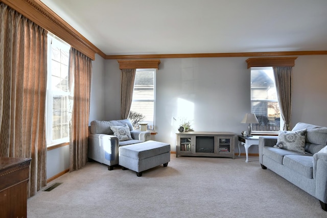 living room featuring light carpet and ornamental molding