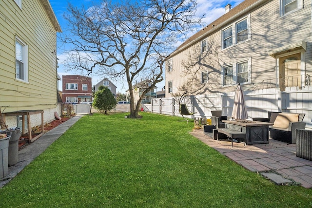 view of yard featuring a patio area and an outdoor fire pit