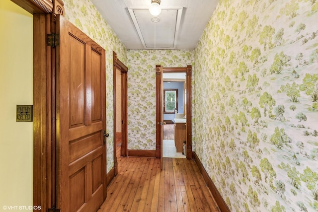 hallway featuring hardwood / wood-style flooring