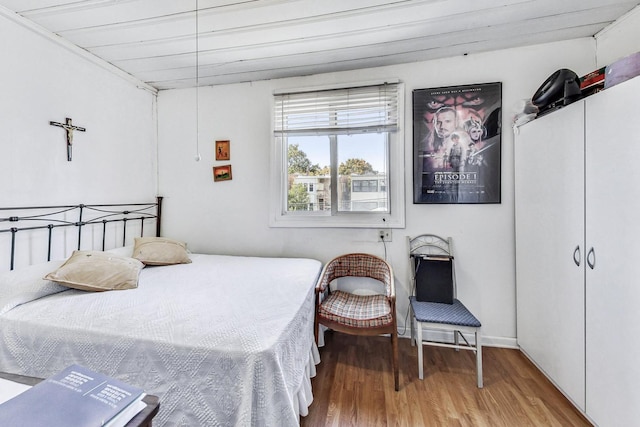 bedroom with light hardwood / wood-style floors