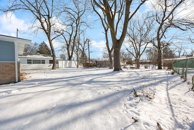 view of snowy yard