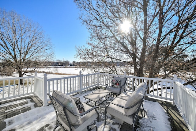 view of snow covered deck