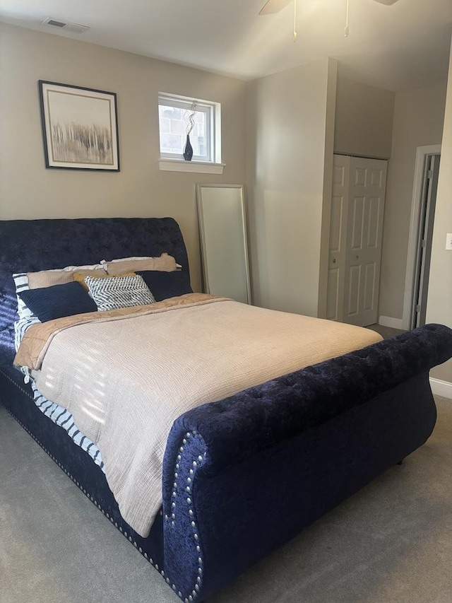 carpeted bedroom featuring ceiling fan